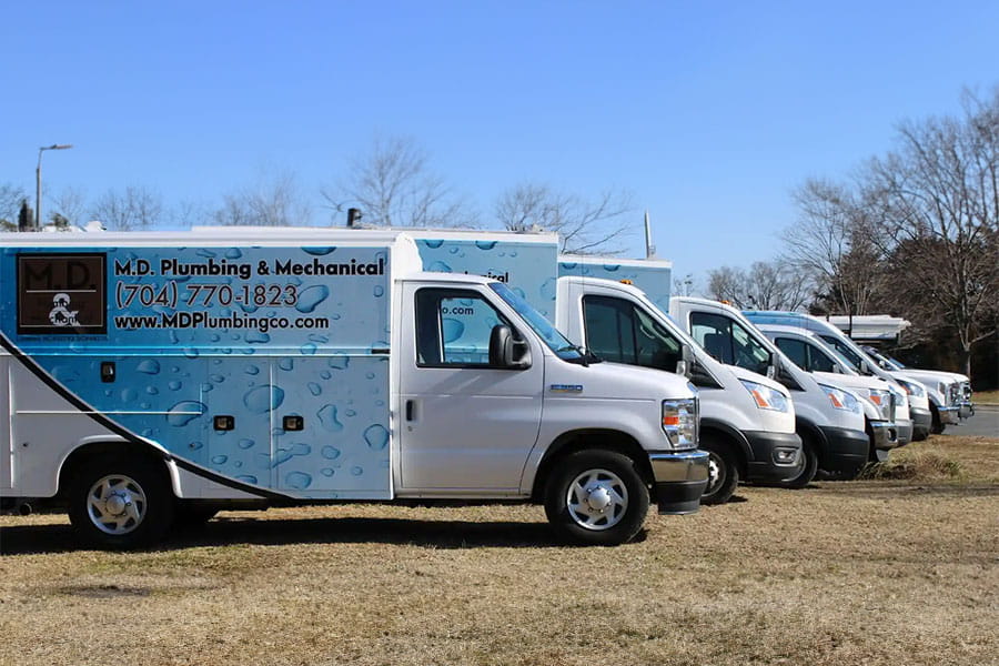 M.D. Plumbing service truck